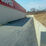 A finished asphalt commercial parking lot at Staples